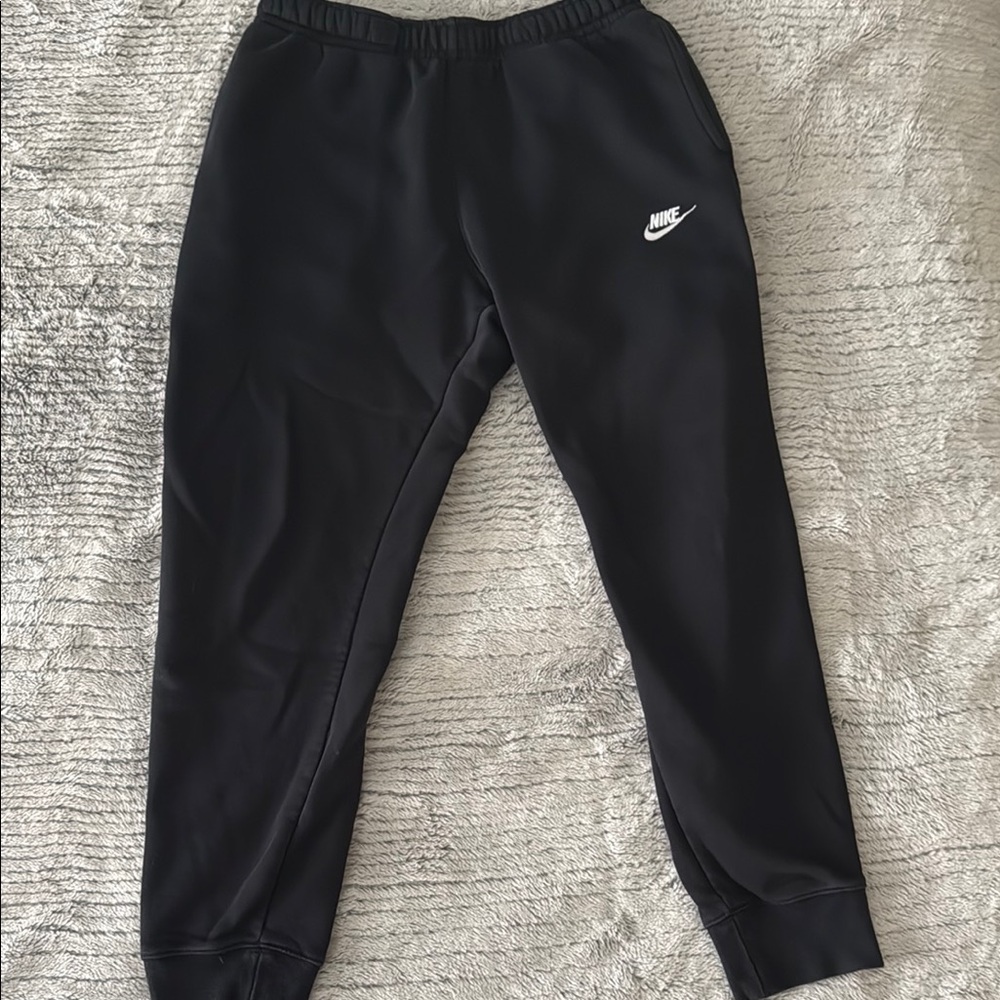 Nike Black Sweatpants with Elastic Cuffs and Relaxed Fit